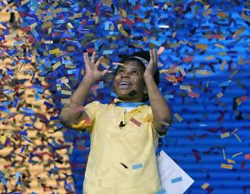 Zaila Avant-garde, 14, from Harvey, La., celebrates winning the finals of the 2021 Scripps National Spelling Bee at Disney World on Thursday. (John Raoux/AP)