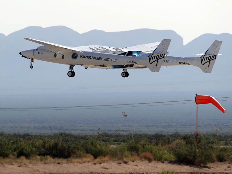The rocket plane carrying Virgin Galactic founder Richard Branson and other crew members takes off