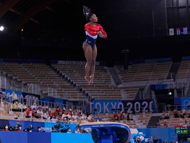 Simone Biles from the U.S. performs on the vault during the gymnastics