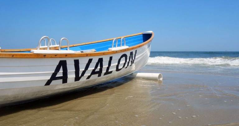 A boat is pictured on the beach in Avalon