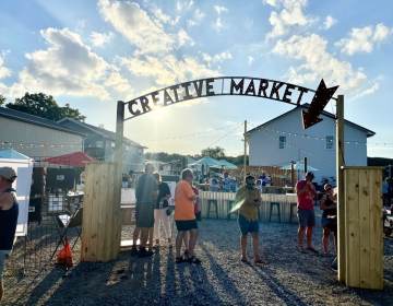 The Developing Artist Collaboration recently launched its open-air market in West Rehoboth to help local artists and other creative businesses. (Johnny Perez-Gonzalez/WHYY)
