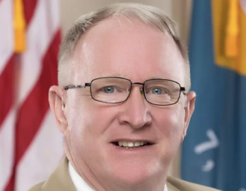 State Rep. Gerald Brady smiles for a portrait