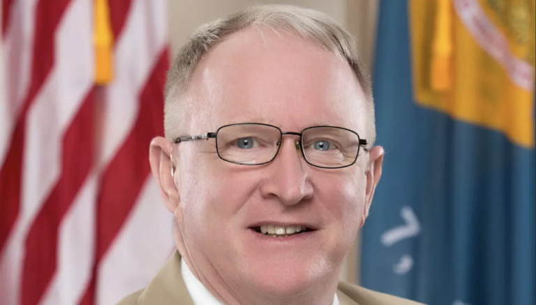 State Rep. Gerald Brady smiles for a portrait