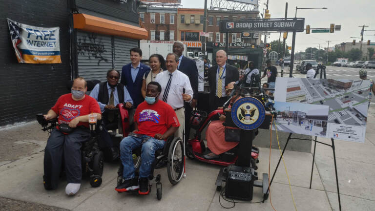 SEPTA Deputy General Manager Robert Lund, U.S. Reps. Dwight Evans and Brendan Boyle of Philadelphia, Liberty Resources CEO Tom Earle, and accessibility advocates for people with disabilities are pictured at a press conference