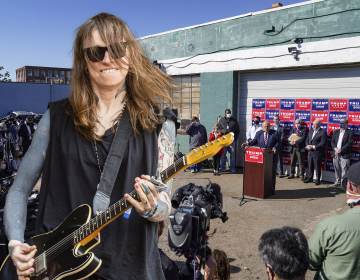 Musician Laura Jane Grace will perform at Four Seasons Total Landscaping in a sold-out concert in August 2021 BILLY PENN ILLUSTRATION VIA AP