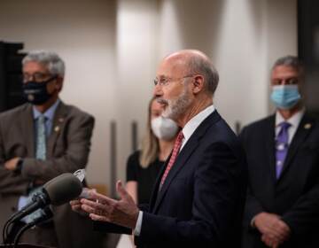 Pennsylvania Gov. Tom Wolf speaks from a podium