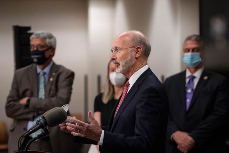 Pennsylvania Gov. Tom Wolf speaks from a podium