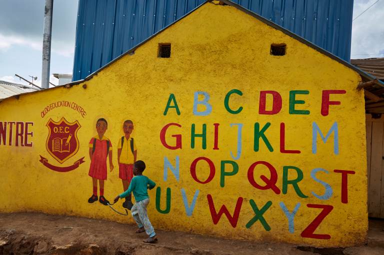 In his new book for young teenagers, Charles Kenny points out signs of global progress, including the growing number of kids in school. Above: The Oloo Education Center aims to provide an education to kids in Kibera, a poor community in Nairobi, Kenya. When you type 