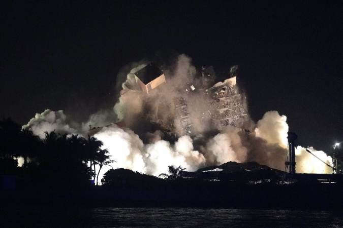 The remaining structure of the Champlain Towers South condo building is demolished