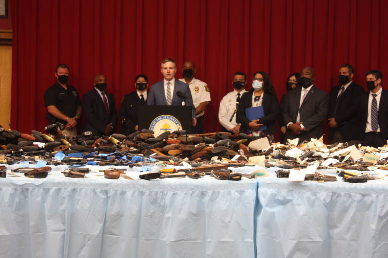 New Jersey Acting Attorney General Andrew Bruck with several law enforcement officials announcing the results of a gun buyback that took place in three counties. (P. Kenneth Burns/WHYY)