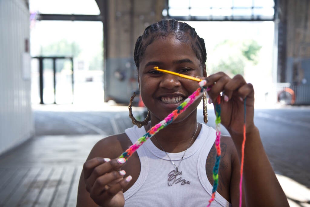 Emani Milan installs yarn vending machine at Cherry Street Pier - WHYY