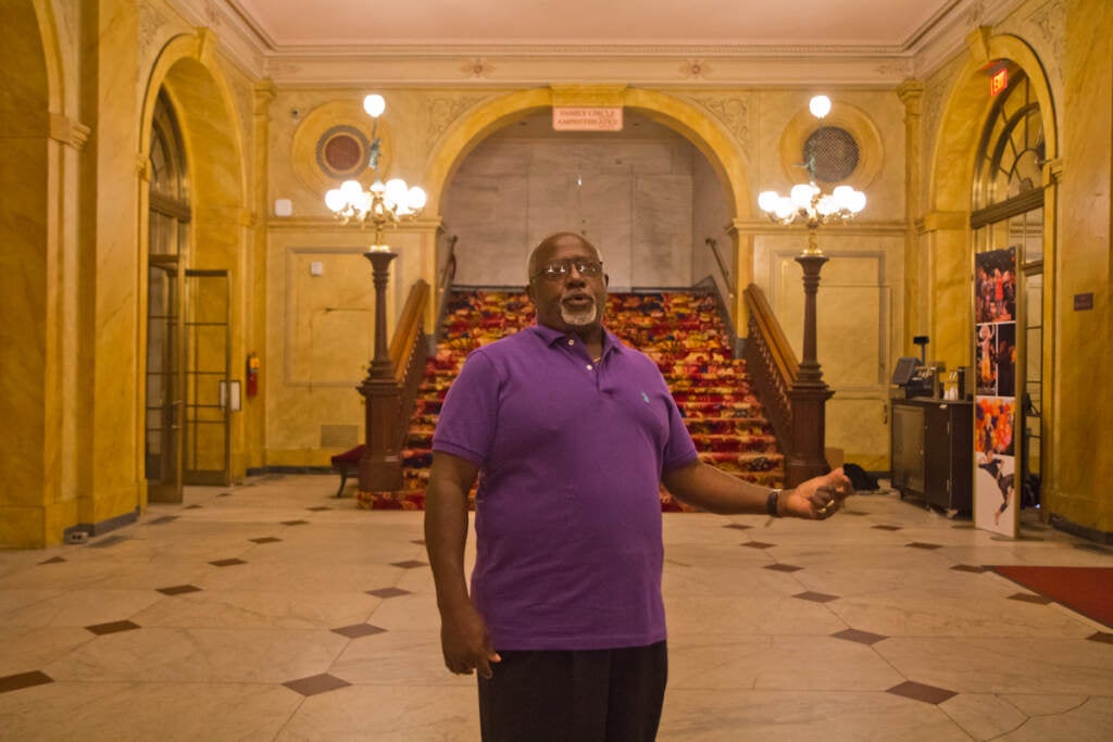 Cornell Wood stands inside the Academy of Music