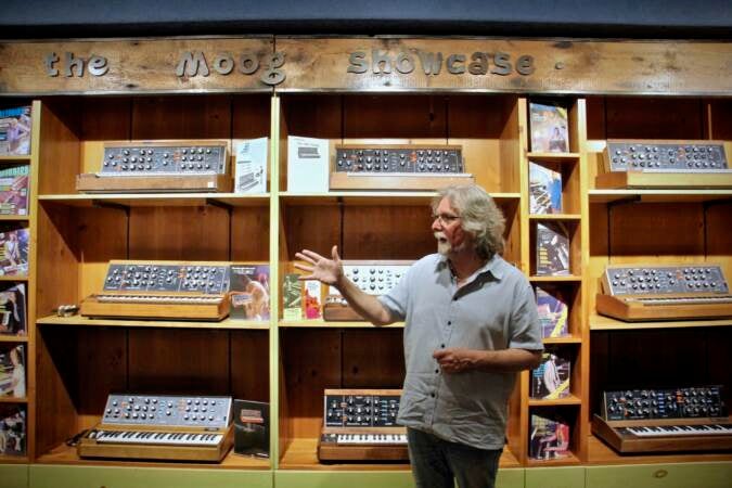 Drew Raison leads a tour of the Moog showcase room