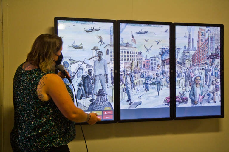 The city of Camden unveiled an historical, interactive mural at City Hall on August 12, 2021. (Kimberly Paynter/WHYY)