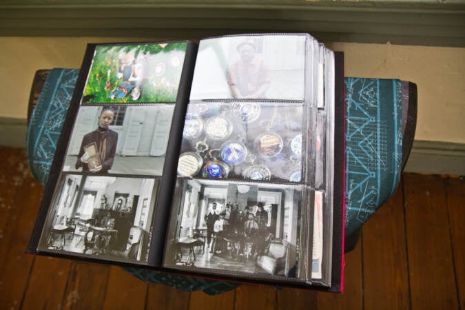 A Black Quantum Futurism photo album, called “the familiar” on display at the Hatfield House