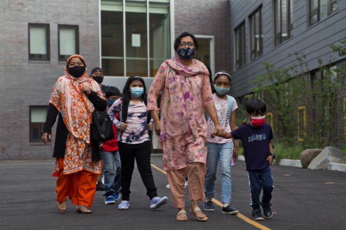 Parents and students stand outside a Philadelphia school