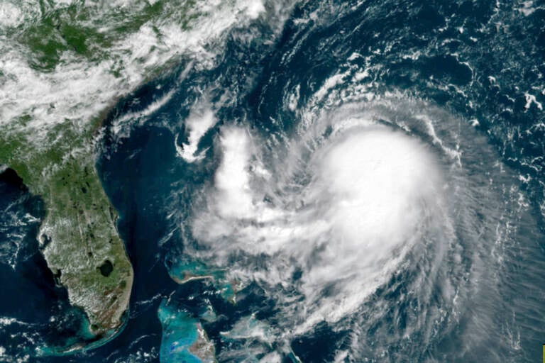 OES-16 East GeoColor satellite image taken Friday, Aug. 20, 2021, at 11:40 a.m. EDT., and provided by NOAA, shows Tropical Storm Henri in the Atlantic Ocean