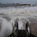 Waves pound the beaches of Montauk, N.Y., Sunday, Aug. 22, 2021, as a severe weather system approaches. (AP Photo/Craig Ruttle)