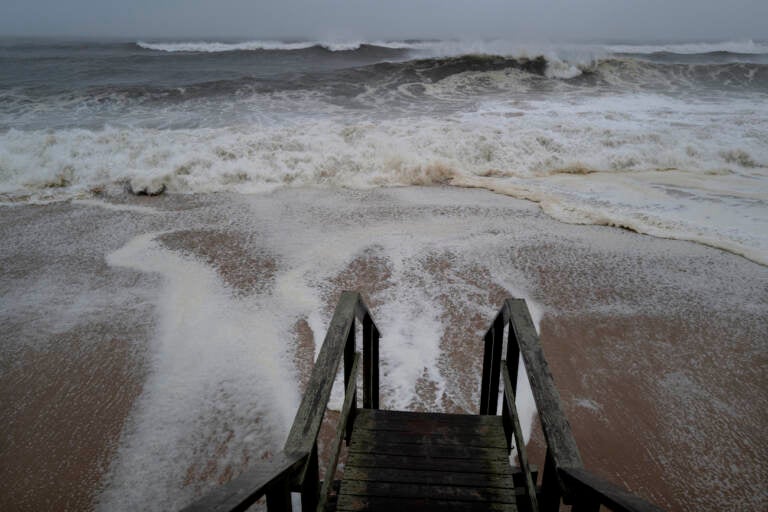 Waves pound the beaches of Montauk, N.Y., Sunday, Aug. 22, 2021, as a severe weather system approaches. (AP Photo/Craig Ruttle)