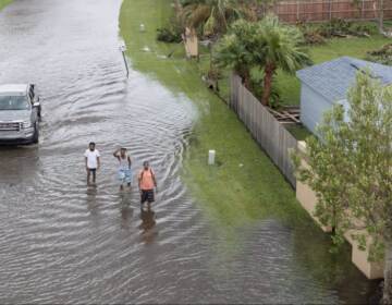 Flooded streets are shown in the Spring Meadow subdivision in LaPlace, La., after Hurricane Ida moved through Monday, Aug. 30, 2021. Hard-hit LaPlace is squeezed between the Mississippi River and Lake Pontchartrain. (Steve Helber / AP Photo)