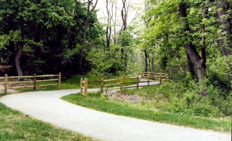 A fenced trail at White Clay Creek State Park