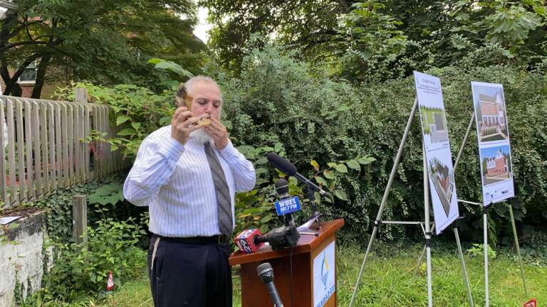 Rabbi Chuni Vogel blows the shofar.