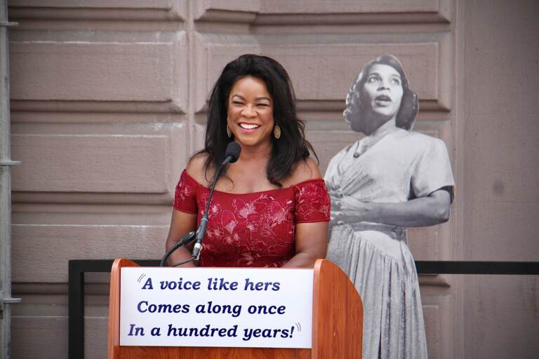 World-renowned mezzo-soprano Denyce Graves speaks at a ceremony to announce that a statue of Marian Anderson will be erected in front of the Academy of Music on South Broad Street. (Emma Lee/WHYY)