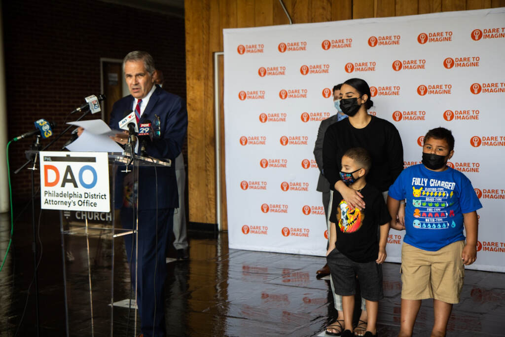 DA Larry Krasner speaks at a press conference.