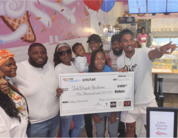 Unity in the Community surprised TahDiyah Jackson and her mother Ameena with a $1,000 scholarship. (Tom MacDonald/WHYY)