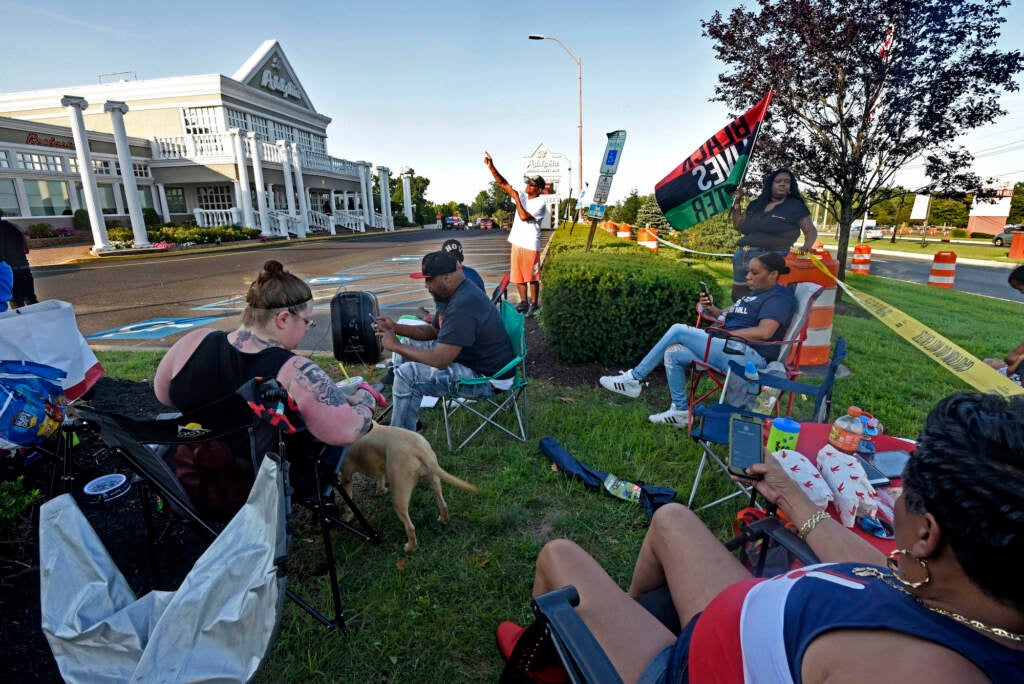 Protesters rally outside Adelphia restaurant