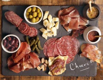 The Centers for Disease Control and Prevention is investigating two salmonella outbreaks that are tied to Italian meats like salami and prosciutto that are often found in charcuterie boards. (Richard Drew/AP)