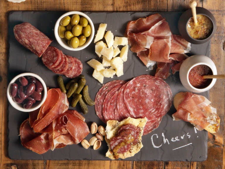 The Centers for Disease Control and Prevention is investigating two salmonella outbreaks that are tied to Italian meats like salami and prosciutto that are often found in charcuterie boards. (Richard Drew/AP)