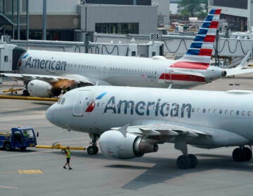 American Airlines passenger jets prepare for departure at Boston Logan International Airport