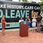 Nour Qutyan speaks at a Paid Leave for All rally