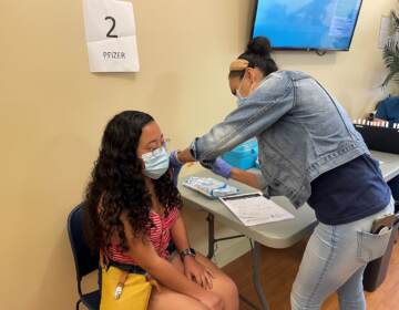 Samantha Del Angel receives a COVID-19 vaccine