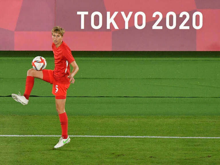 Canada's midfielder Quinn warms up prior to the Tokyo Olympics women's final soccer match between Sweden and Canada on Aug. 6. (Tiziana Fabi/AFP via Getty Images)