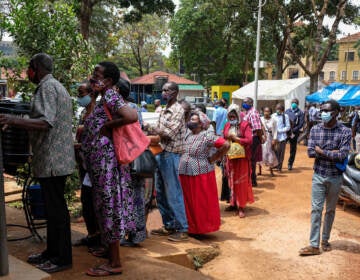 People line up last week to receive COVID-19 vaccines in Kampala, Uganda