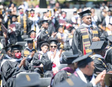 Students applaud at the Morehouse College commencement ceremony on May 16, 2021, in Atlanta. Morehouse recently announced it would clear remaining tuition balances for students, joining several other HBCUs doing the same. (Marcus Ingram/Getty Images)