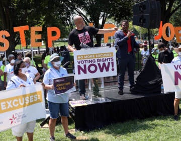 Demonstrators demand action on voting rights.