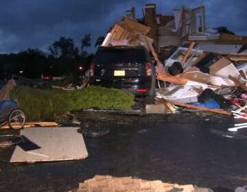 A damaged home in the wake of a possible tornado