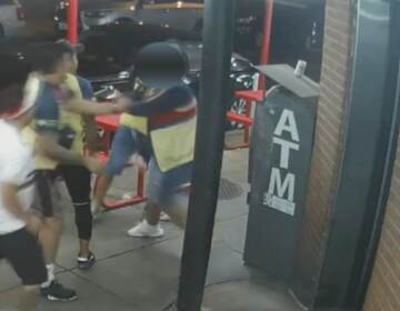 An image from security footage shows alleged suspects in the fatal beating