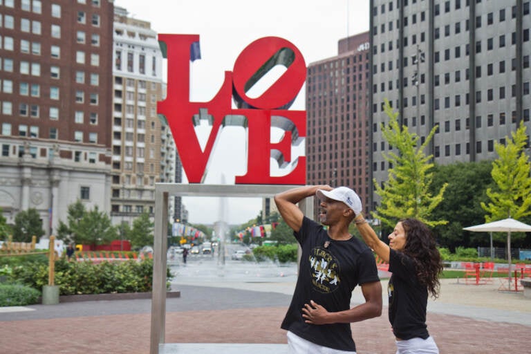 Mark ‘Maestro Flaco’ Best dances with Lana Corrales at Siempre Salsa’s free lunch time dance lesson at LOVE Park in Center City Philadelphia. (Kimberly Paynter/WHYY)