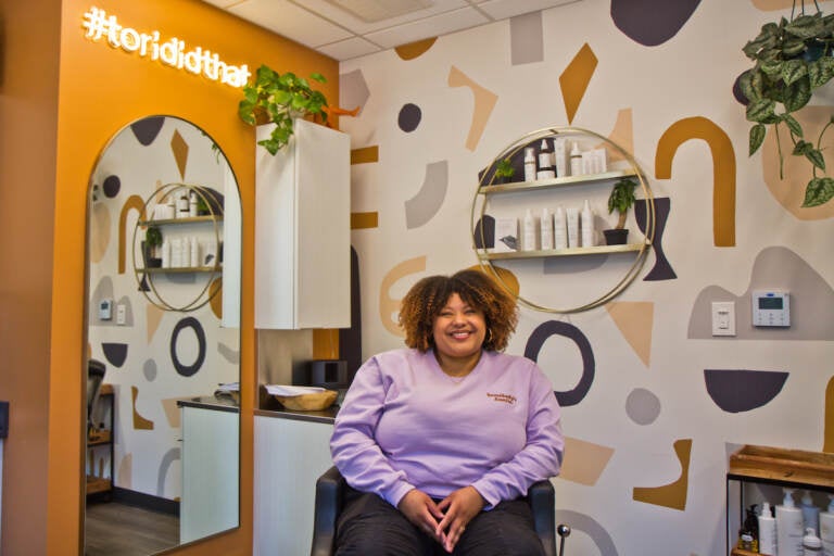 Tori McCutcheon is a curly hair stylist and owner of Tori Did That studio in Philadelphia’s Head House neighborhood. (Kimberly Paynter/WHYY)