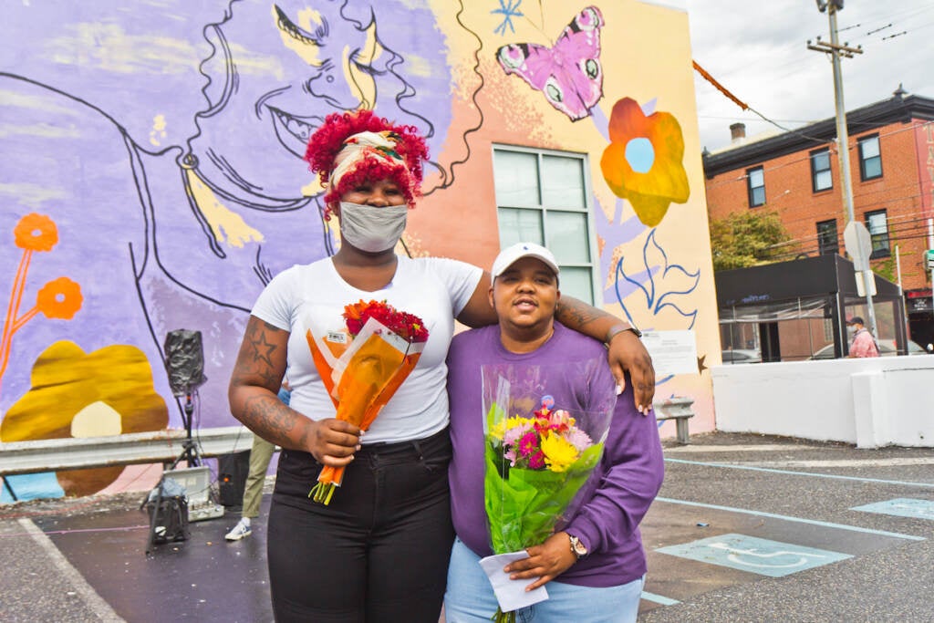 Morris Home residents Jourdyn Wood (left) and Tazmere Stephens (right) are featured in the We Are Universal mural, dedicated to Philadelphia’s trans community