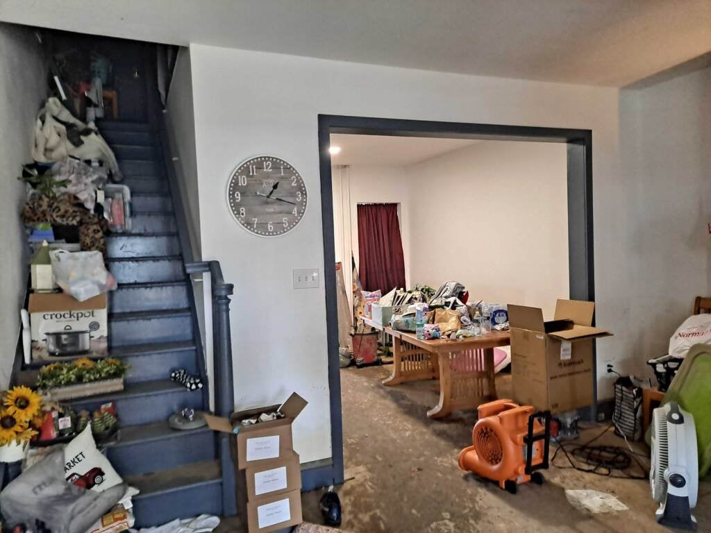 Damaged house in aftermath of flood.