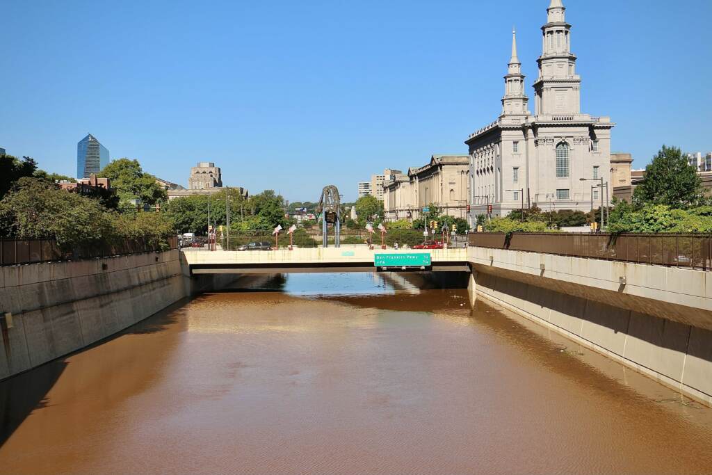 Flooding closes the Vine Street Expressway from Broad Street to the Schuylkill River.