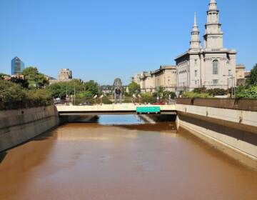 Flooding closes the Vine Street Expressway from Broad Street to the Schuylkill River.