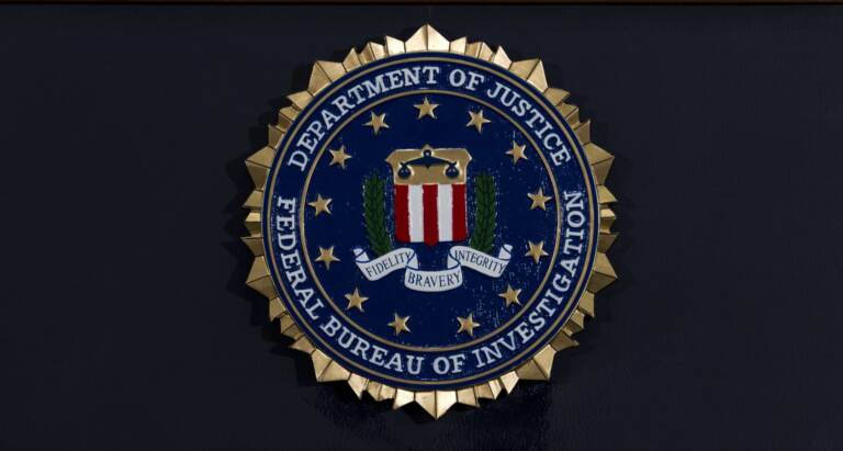 FILE PHOTO: The FBI seal is seen before a news conference at FBI headquarters in Washington on June 14, 2018. (Jose Luis Magana / AP Photo)