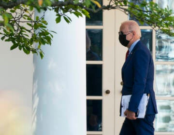 President Joe Biden walks along the Colonnade towards the Oval Office as he returns to the White House after visiting Brookland Middle School in northeast Washington, Friday, Sept. 10, 2021. (AP Photo/Manuel Balce Ceneta)