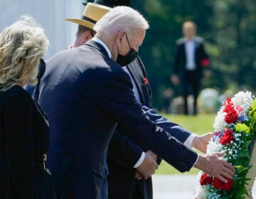 President Joe Biden and first lady Jill Biden lay a wreath at the Wall of Names during a visit to the Flight 93 National Memorial in Shanksville, Pa., Saturday, Sept. 11, 2021